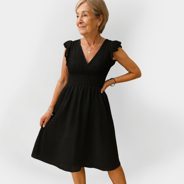 Stulbinanti suknelė su pūstomis rankovėmis