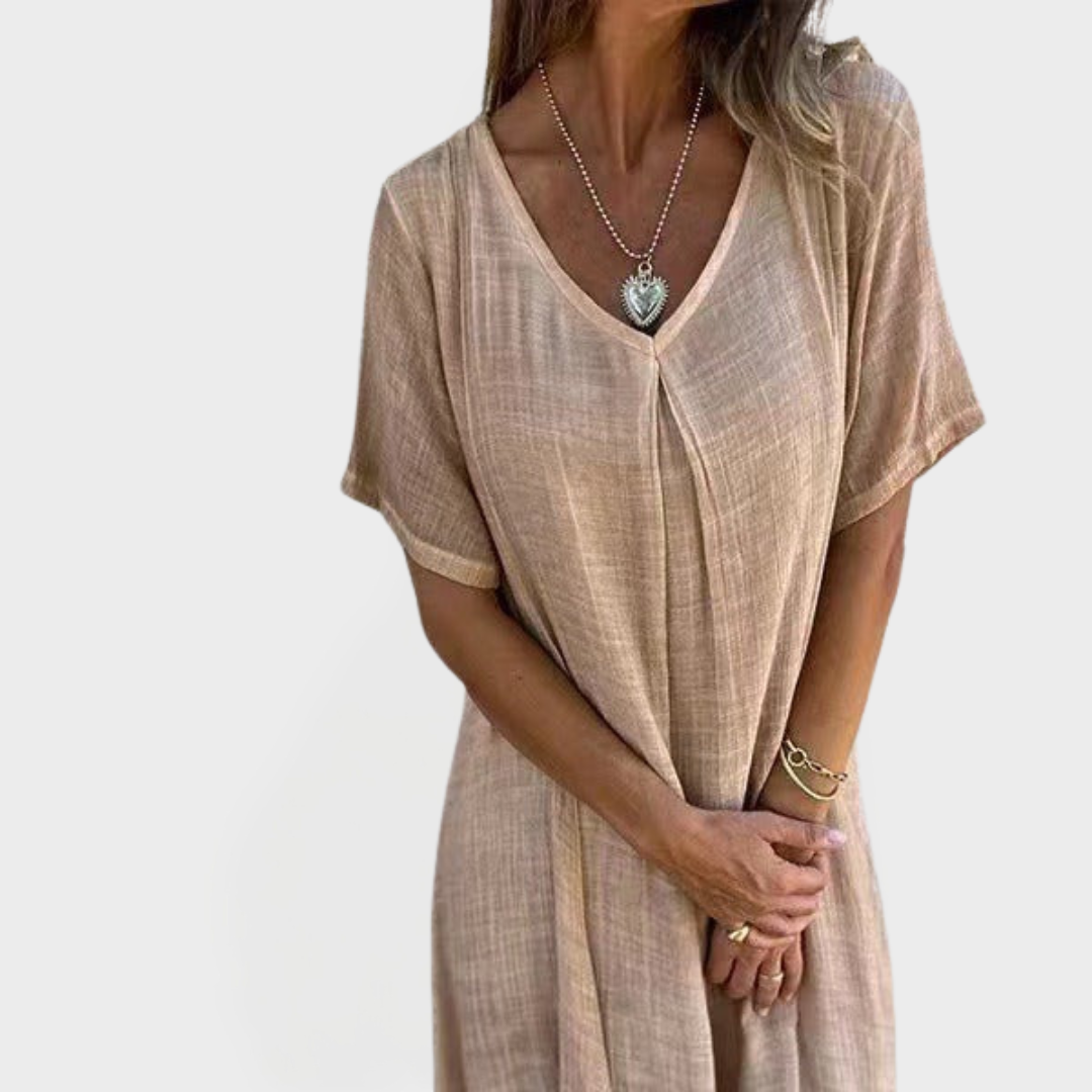 Suknelė su V formos iškirpte