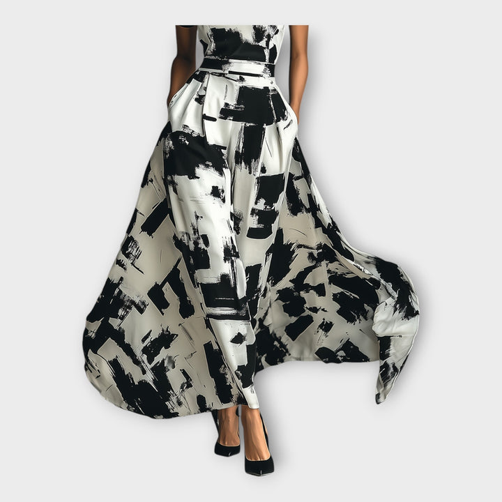 Ilga suknelė su meniniu žavesiu