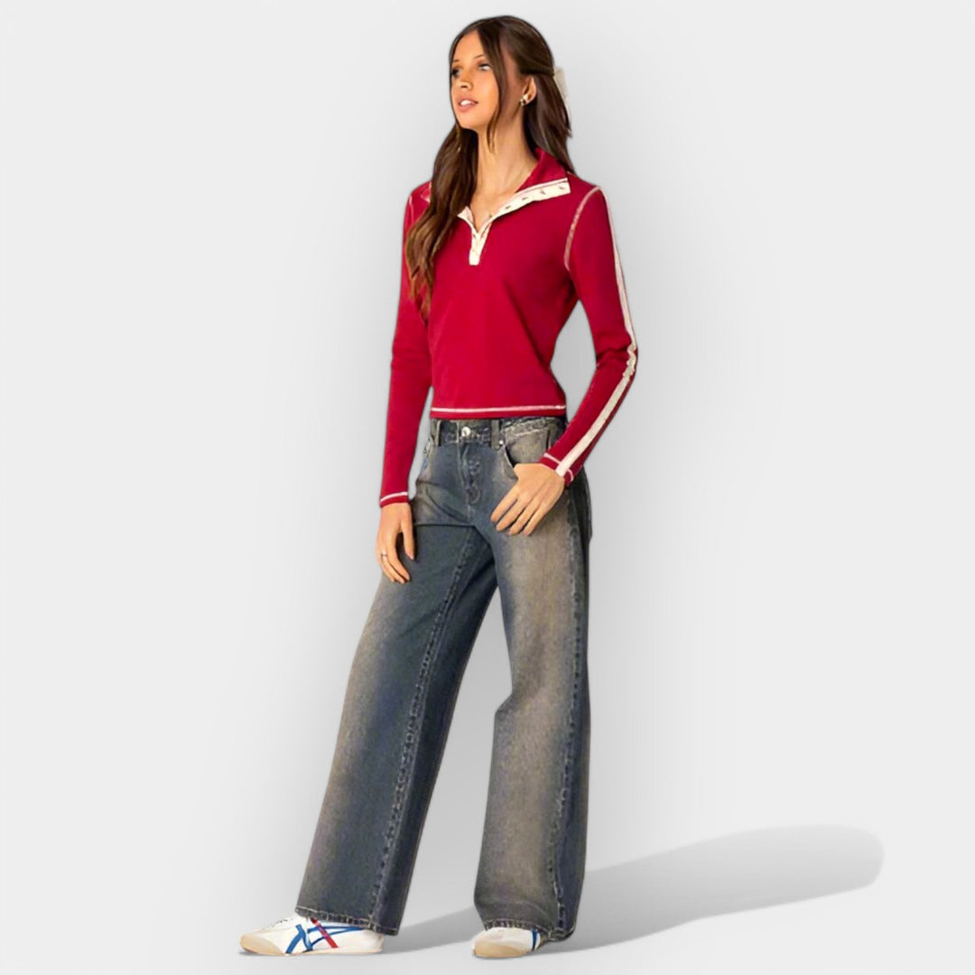 Džinsai su žemu liemeniu.