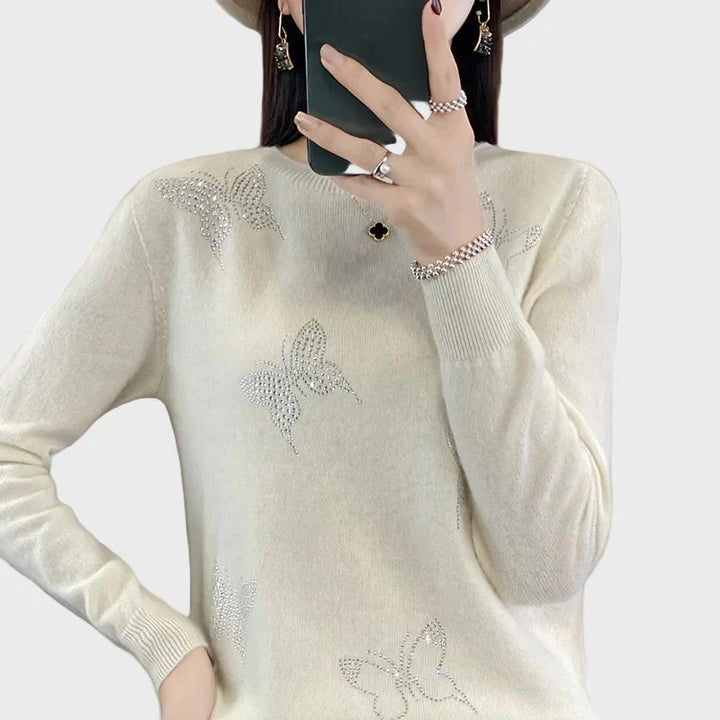 Pynėtas golfas su drugelio raštu