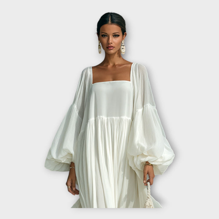 Lengva suknelė su elegantiška minimalizmo estetika